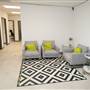 Seating area in hallway outside private offices